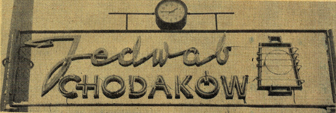 Neon nad bramą wjazdową do fabryki jedwabiu